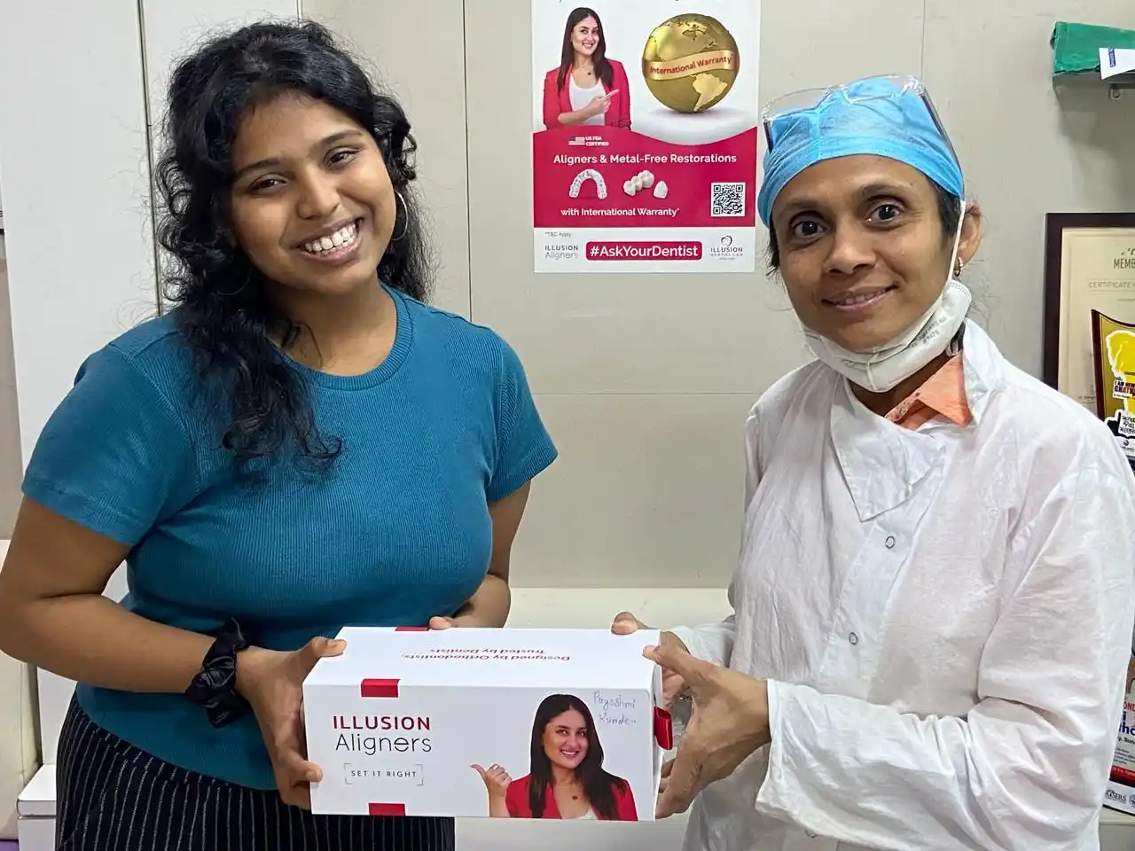 Dr. Bhavna D. Dedhia handing an Illusion Aligners kit to a patient at her Ghatkopar East dental clinic
